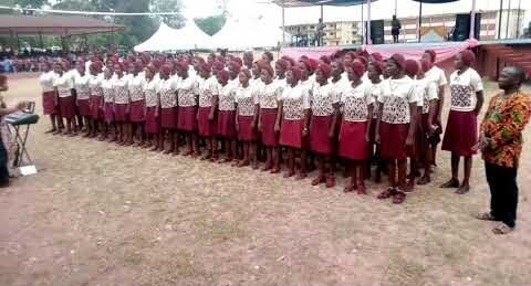 Students singing the NIgerian National Anthem